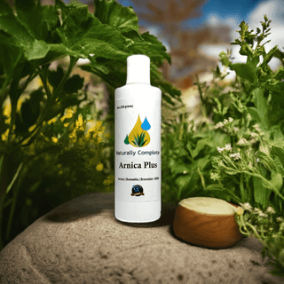 Arnica Plus plant-based relief bottle amidst greenery, highlighting soy-free, non-GMO ingredients.