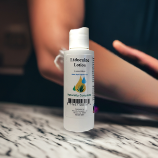 A 4 oz. bottle of Lidocaine Cream with a person rubbing the cream on their elbow