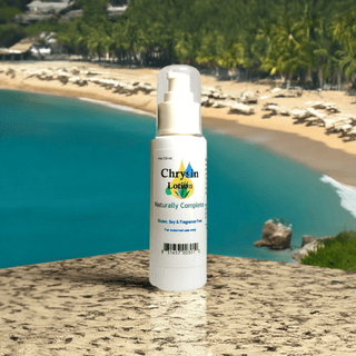 Chrysin lotion bottle by a beach, non-GMO and soy-free, promotes energy and lean muscle mass, plant-based product.