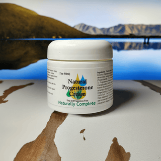 Natural Progesterone Cream 2 oz jar, Soy-Free, Non-GMO transdermal lotion for hormone therapy, plant-based product.