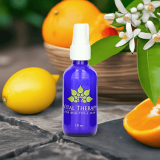 "Vitamin C Caffeine Daytime Serum bottle surrounded by fresh citrus fruits, promoting USA-made skincare benefits."