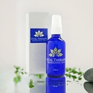 Blue bottle of Vital Therapy Peptide Eye Treatment Cream with box, suitable for non-toxic skincare enthusiasts.